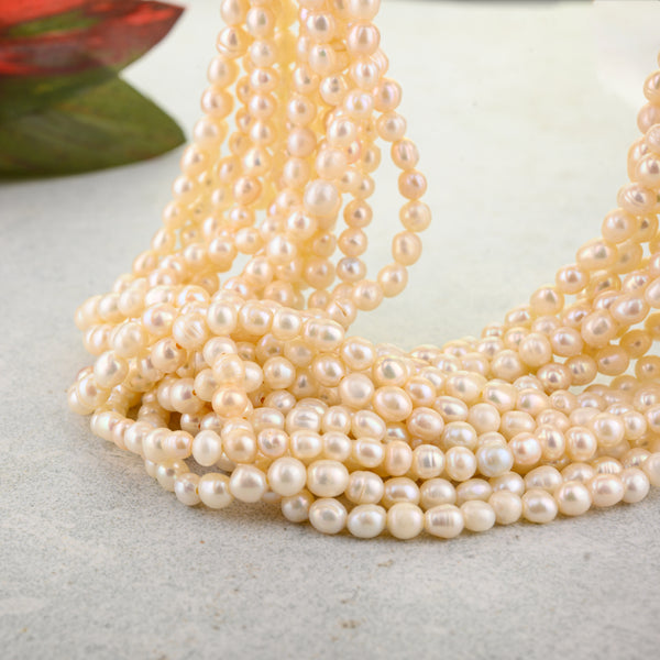 Natural Freshwater Pearls 4.50 - 5 Mm Smooth Oval Gemstone Beads Strand